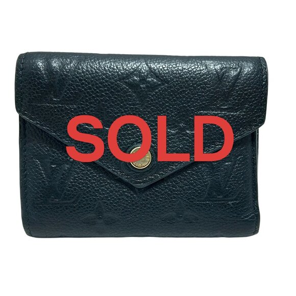 LOUIS VUITTON Portefeuille Victorine Noir Monogram Empreinte - 437-052325 - Picture 1 of 8